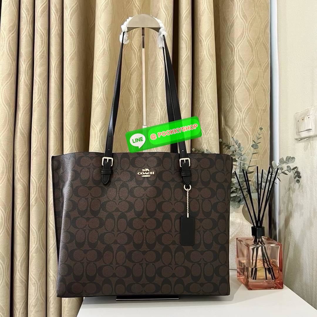 Coach MOLLIE TOTE IN SIGNATURE CANVAS (COACH 1665) กระเป๋าหนังใบเคลือบซิกเนเจอร์และหนังเรียบ ภายในกระเป๋ามัลติฟังก์ชั่น ปิดด้วยซิป ซับในผ้า หูหิ้วพร้อมหูหิ้ว 10 1/4" ช่องเปิดด้านข้าง