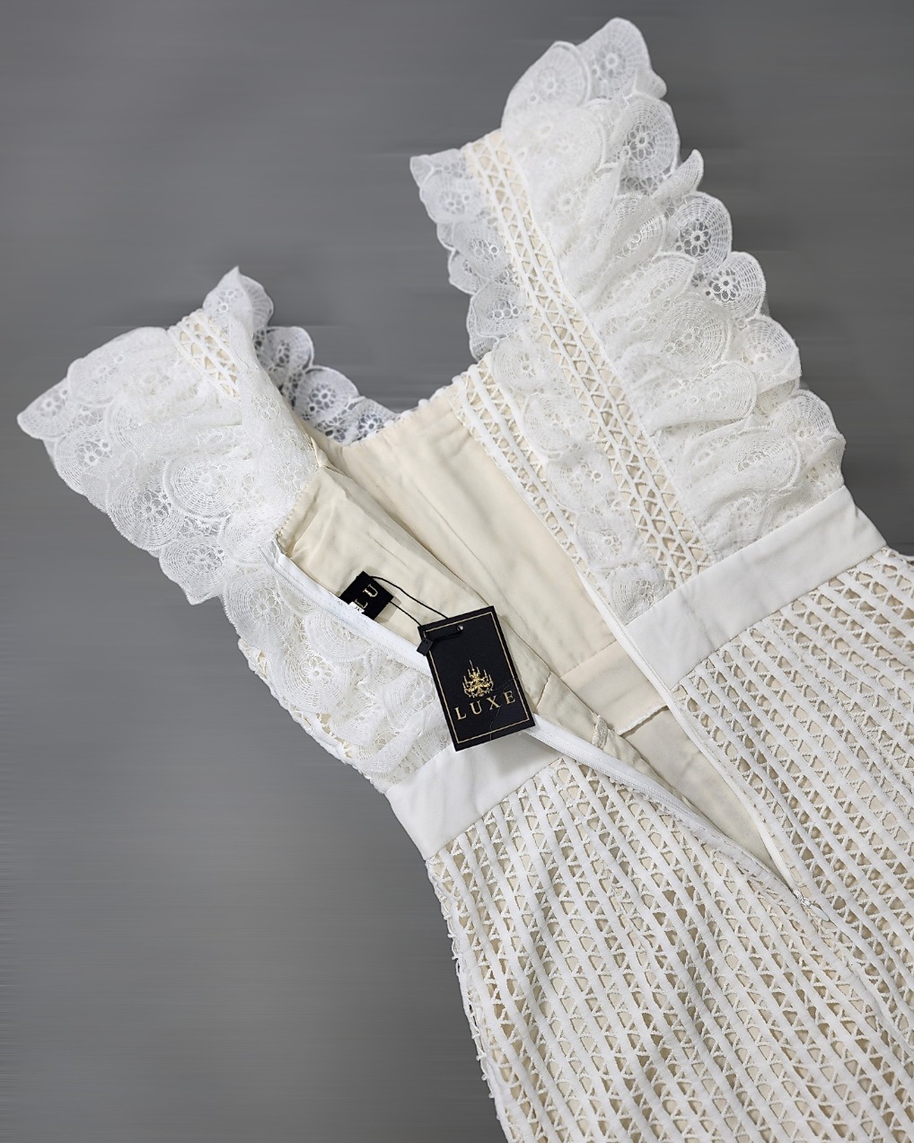 เดรสแฟชั่น เดรสผ้าลูกไม้คอตตอนโครเชต์ เสื้อแขนกุดแต่งระบาย กระโปรงสั้นทรงเอ