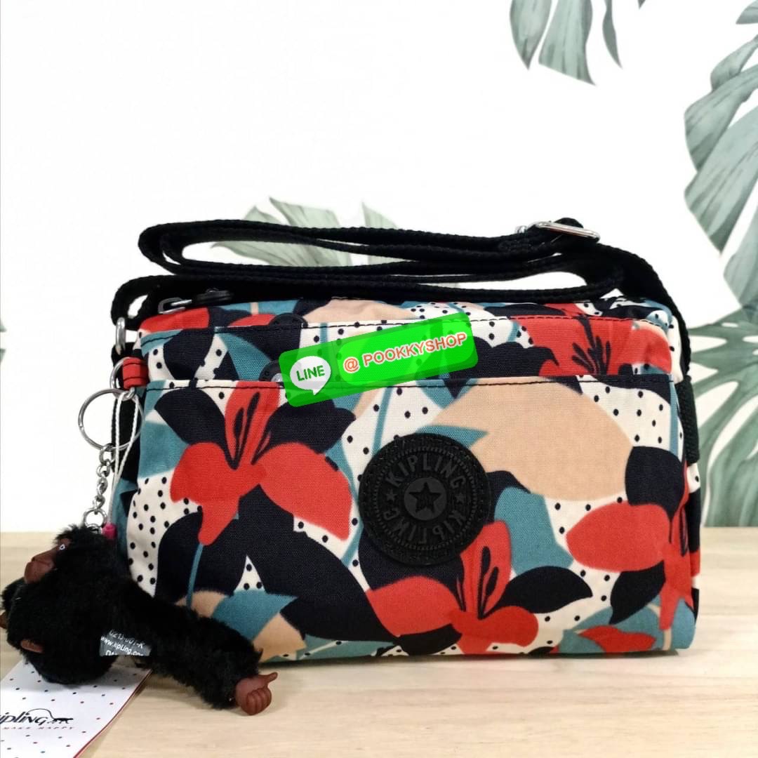 KIPLING Mini Crossbodybag กระเป๋าสะพายข้างขนาดกะทัดรัด ผลิตจากวัสดุ Nylon + ซับใน Polyester100% มีช่องใช้งานแยกย่อยมากถึง 4 ช่อง -ด้านหน้ามีช่องซิป 2 ช่อง -ช่องหลักโล่ง กว้าง จุของใช้ได้เยอะ -ด้านหลังมีช่องซิปอีก 1 ช่อง มาพร้อมพวงกุญเเจลิง สายสะพายยาวสมาร