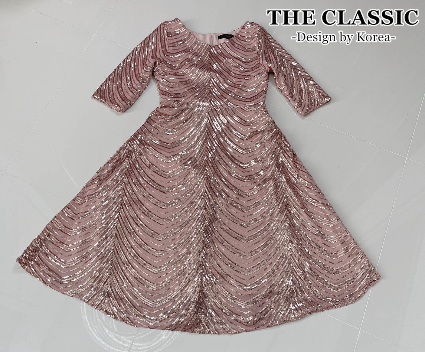 เดรสแฟชั่น ชุดเดรสออกงานปักเลื่อมใช้ผ้าเนื้อดีปักด้วยเลื่อมสีเงิน