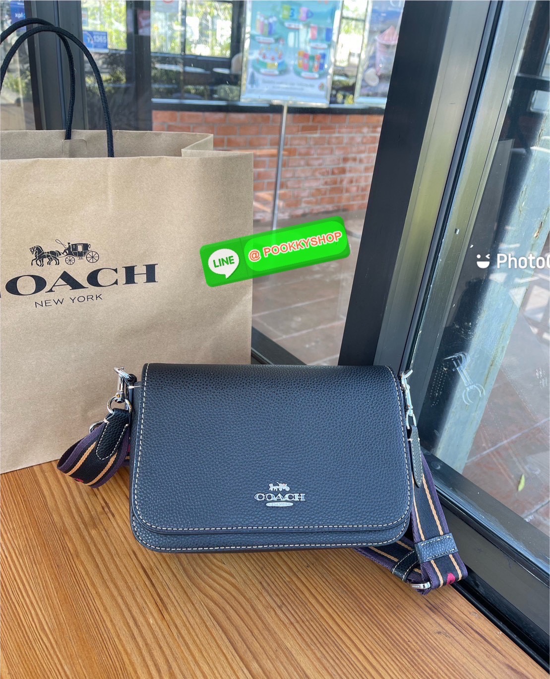 COACH CH483 – Camera Bag Strap Logo สุดจี๊ด รุ่นยอดนิยม โดดเด่นด้วยสายสะพายผ้าแถบโลโก้ COACH สีน้ำตาล -ดำ สะดุดตาไม่ซ้ำใคร! ดีไซน์ทรงกล่องกระทัดรัด ใส่มือถือ กระเป๋าสตางค์ และของใช้ประจำวันได้ครบ วัสดุ Signature coated canvas + หนังแท้ มาพร้อมฮาร์ดแวร์ทอง