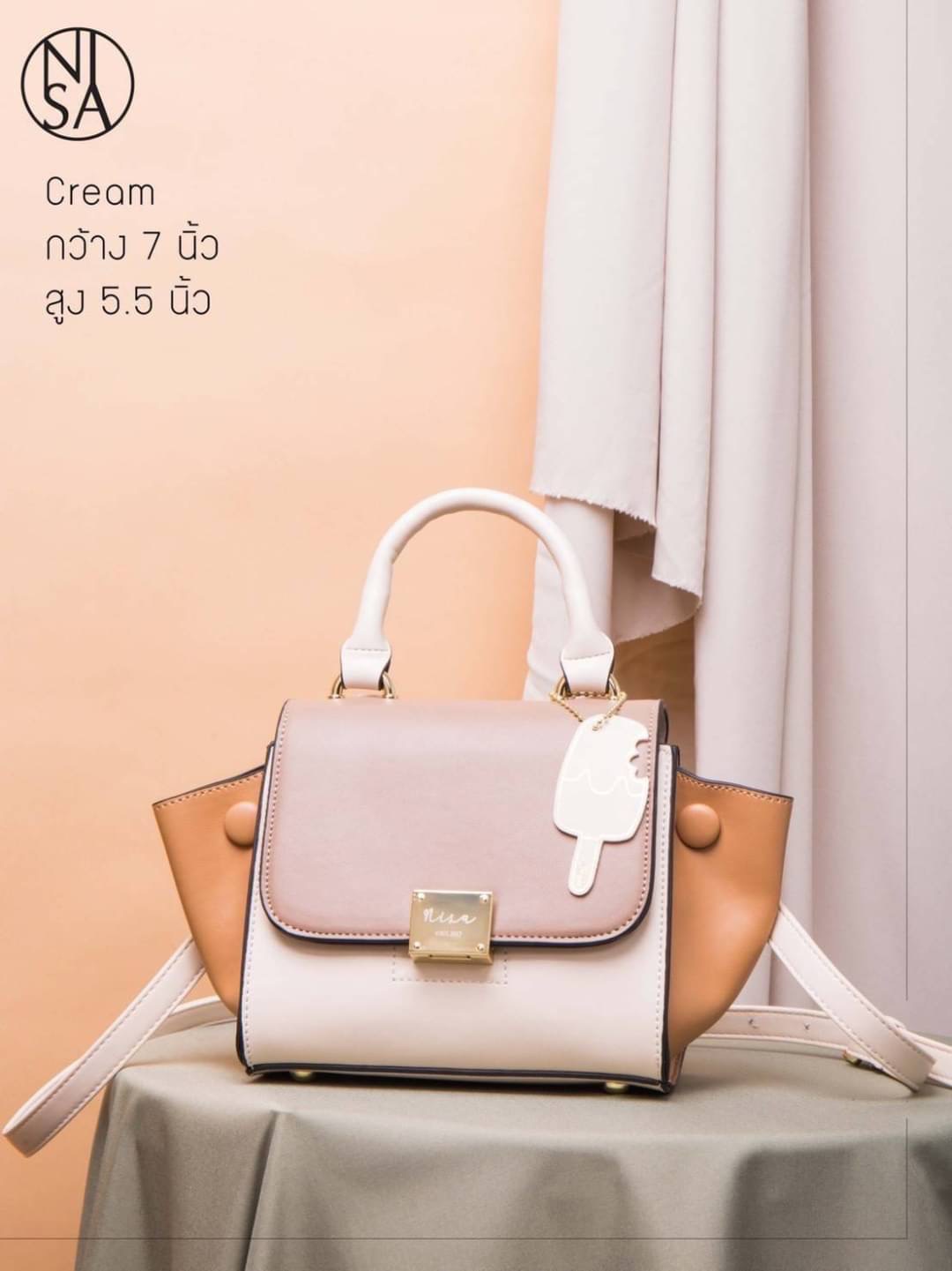 NISA Style My Authentic Brand สุดปังงง !! ~ พร้อมส่ง NISA bag งานสวยยืนหนึ่งแห่งปี ดีไซน์เก๋ ไม่ซ้ำใคร โลโก้และอะไหล่เป๊ะทุกจุด แต่งสี 3tone สดใส ขนาดกระทัดรัดน่าใช้ มาพร้อมพวงกุญแจน่ารักๆ และมีสายสะพายยาว 1 เส้น ด่วน !!! สินค้ามีจำนวนจำกัดค่ะ