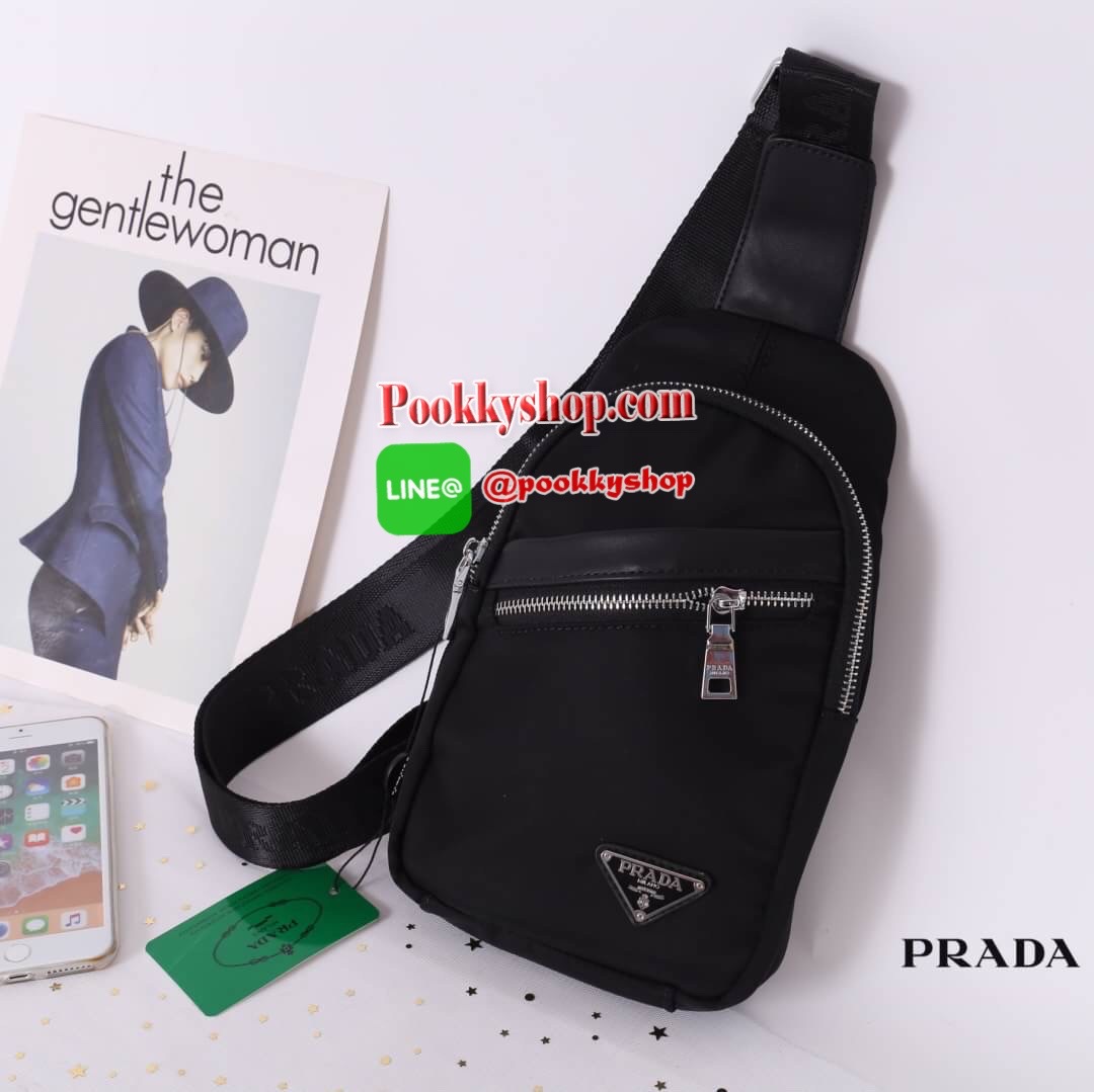 Prada nylon mini sling backpack สินค้า Premium gift 100% กระเป๋าคาดตัว คาดไหล่ คาดอก ทำจากวัสดุผ้าไนลอนคุณภาพดี น้ำหนักเบา อะไหล่เงิน มีช่องใส่ของด้านหน้า ช่องกระเป๋าสามารถจุของได้พอประมาณ ใส่ Iphone + ของจุกจิก ปากกา ได้สบายเลยค่ะ สายสามารถปรับได้ พิมพ์ล