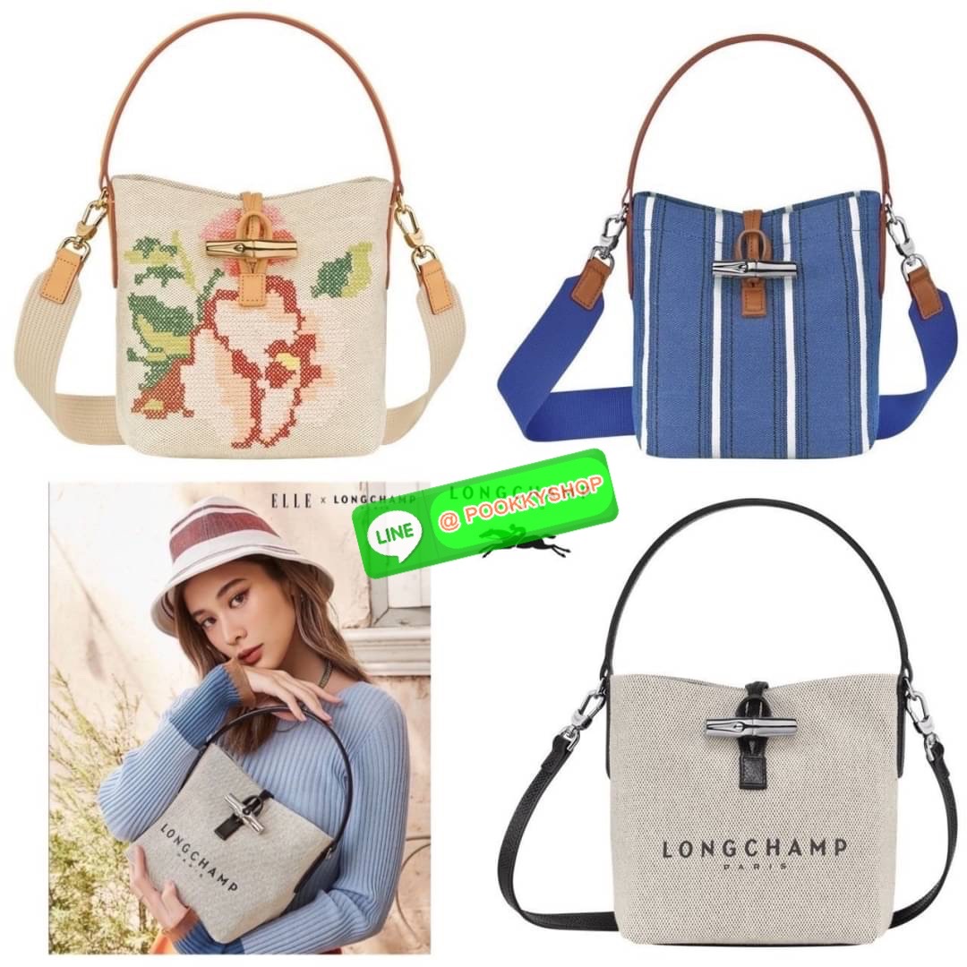Long Champ Roseau Essential Raye กระเป๋าทรงถังขนาดเล็ก วัสดุผ้าฝ้ายลายทาง ตัดแต่งหนังวัว ซับในผ้าฝ้ายสีพื้น สีสันสดใส สามารถใช้ในชีวิตประจำวันได้อย่างสะดวก น้ำหนักเบา จุของได้เยอะ ด้านในมีกระเป๋าซิป 1 ช่อง มีสายสะพายไหล่ ถอดสายได้ ห้ามพลาดเลยค่า