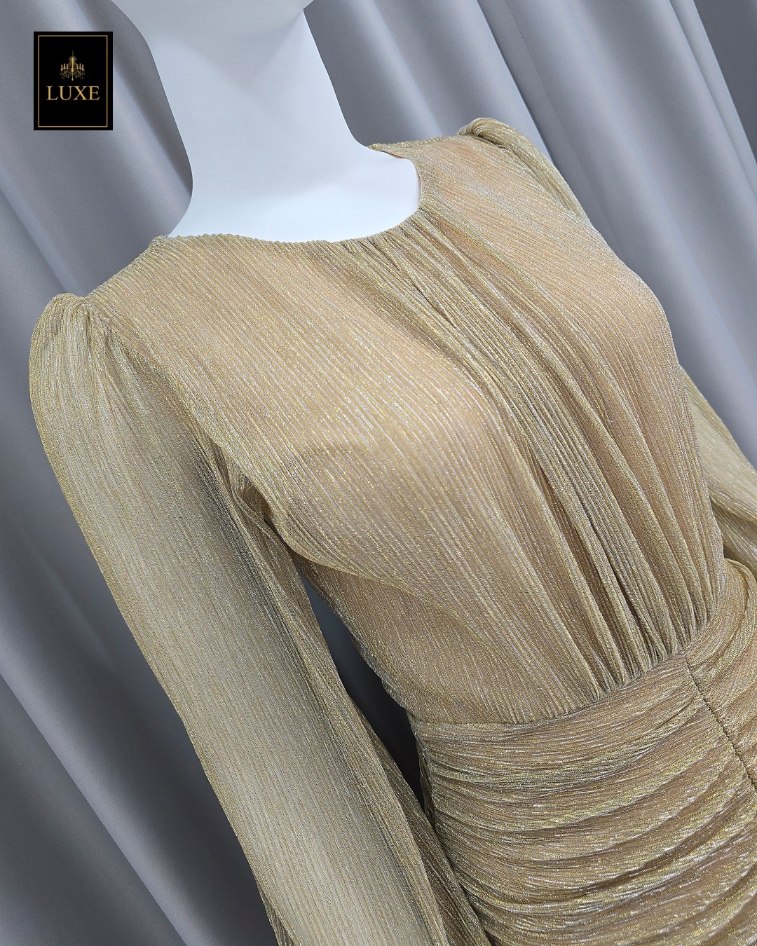 เดรสแฟชั่น เดรสเสื้อคอกลมแขนยาว กระโปรงทรงเข้ารูปจับเดรปตรงกลาง ต่อชายระบาย