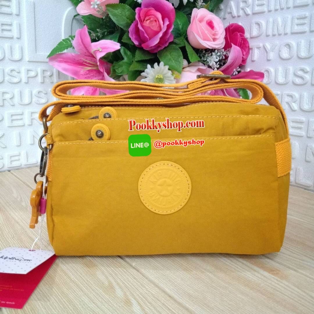 KIPLING Mini Crossbodybag กระเป๋าสะพายข้างขนาดกะทัดรัด ผลิตจากวัสดุ Nylon+ Polyester100% มีช่องใช้งานแยกย่อยมากถึง 4 ช่อง -ด้านหน้ามีช่องซิป 2 ช่อง -ช่องหลักโล่ง กว้าง จุของใช้ได้เยอะ -ด้านหลังมีช่องซิปอีก 1 ช่อง มาพร้อมพวงกุญเเจลิง สายสะพายยาวสามารถปรับไ