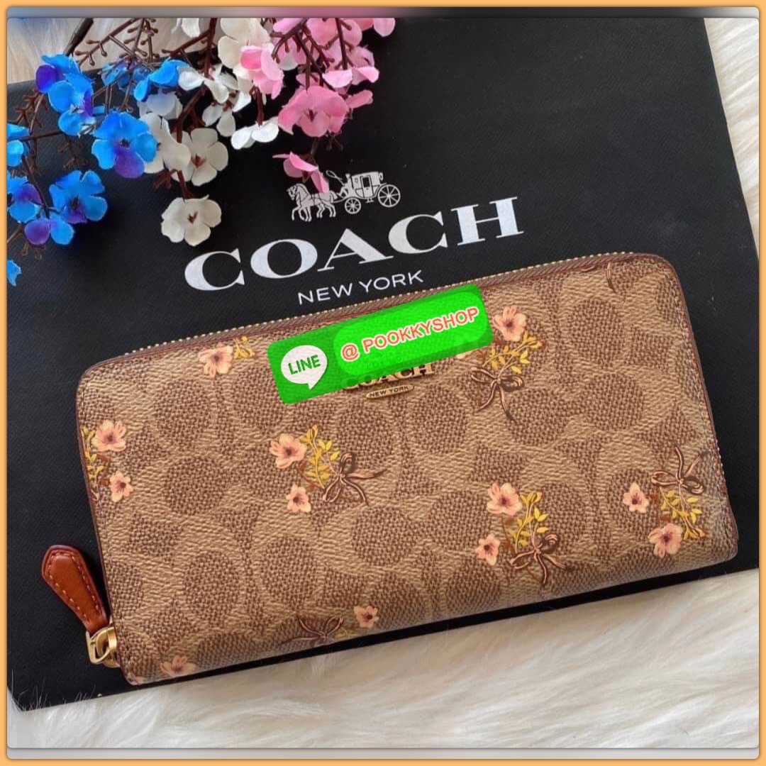 Coach Accordion Zip Wallet In Signature Canvas With Floral Bow Print