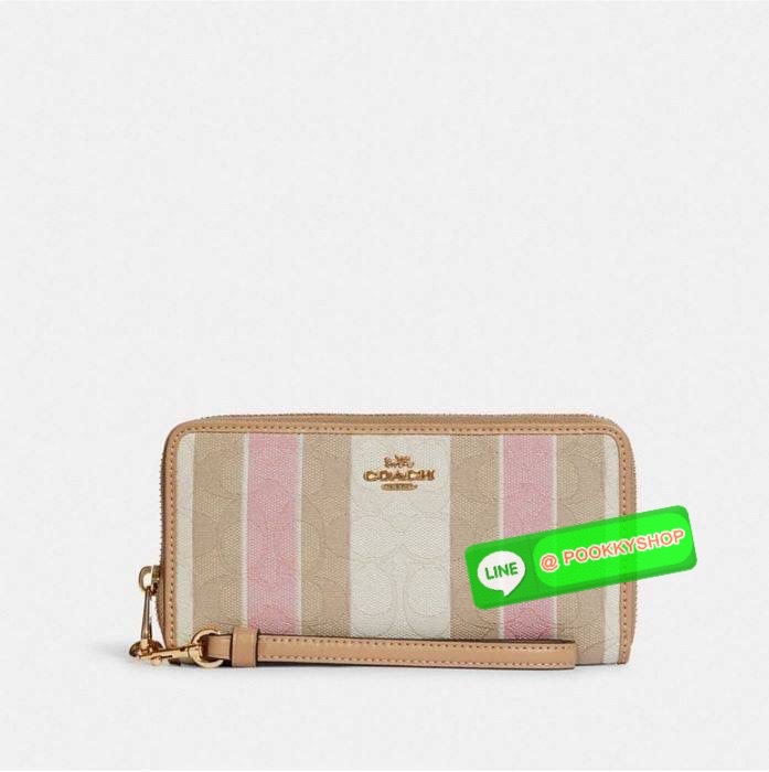 COACH C8313 LONG ZIP AROUND WALLET WITH SIGNATURE JACQUARD WITH STRIPES พร้อมเสิร์ฟความเลิศหรู ใหม่ล่าสุด กระเป๋าสตางค์ใบยาวกึ่งคล้องมือ ดีไซน์ผู้ดี๊ผู้ดี รุ่นขายดี ถือใช้คือขับผิวสุด!! วัสดุผ้า jacquard ลวดลายดูแพง มาพร้อมสายคล้องมือ ถอดออกได้ ภายในใส่บั