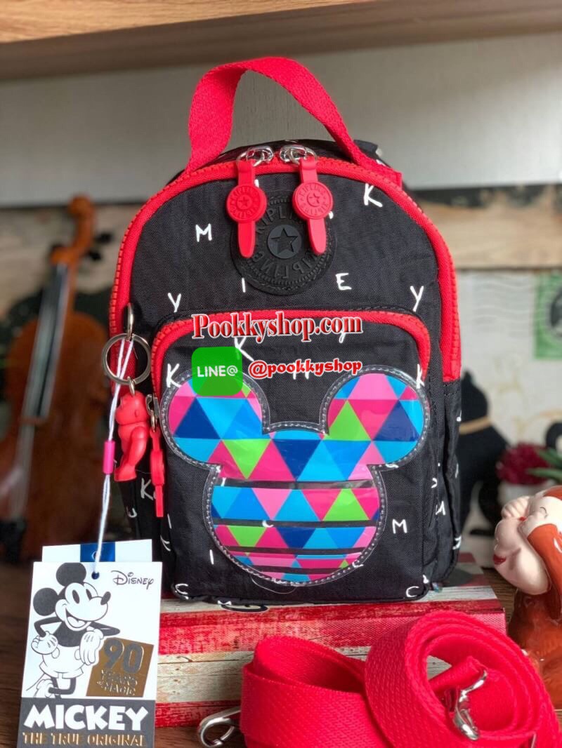 Kipling BRight Disney's Minnie Mouse And Mickey Mouse รุ่น Mini Backpack เป็นได้ทั้งทรงcrossbody และmini Backpack พร้อมสายสะพาย2เส้น ปรับฟรีไซส์ได้ สามารถน้ำหนักเบา วัสดุ100% Polyamide ดีเทลน่ารักๆจากบรรดามิคกี้และมินนี่ที่มาวาดลวดลายลงบนกระเป๋าให้ดู