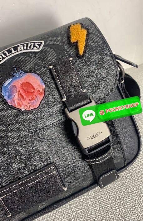 Coach Disney X Coach Track Crossbody In Signature Canvas With Patches Signature coated canvas and smooth calf leather Inside multifunction pockets Zip and speedclip closures, fabric lining Outside slip pocket