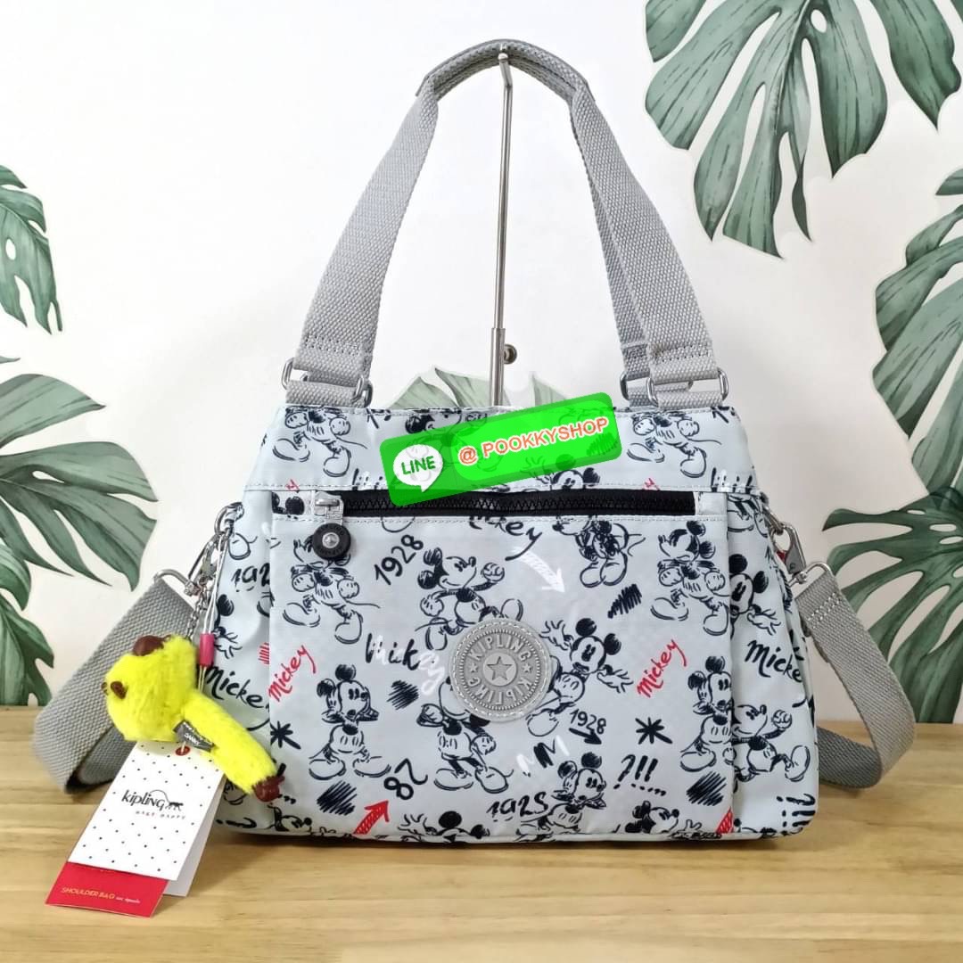 KIPLING ELISE HANDBAG กระเป๋าถือและสะพายไหล่ วัสดุ Nylon +Polyester ขนาดกำลังพอดี จุของได้มาก มีหูจับสองสาย ถือสะดวก น้ำหนักเบา มีช่องซิป ด้านหน้า ช่อง กระเป๋าหลักเปิด-ปิดด้วยซิป มี3 ช่องว่างใส่ของได้จุมากๆ ใส่มือถือได้ กระเป๋าสตางค์ใบยาว และ เครื่องสำอาง