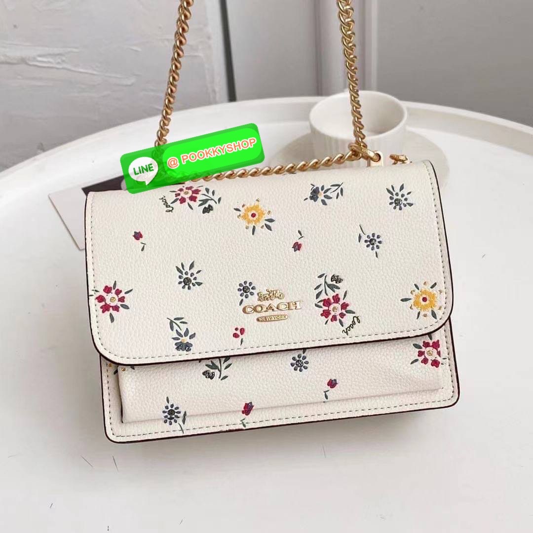 KLARE CROSSBODY WITH Flowers EMBROIDERY IM/CHALK MULTI Smooth leather| Inside zip and multifunction pockets| Snap closure, fabric lining| Outside slip pocket| Strap with 22" drop doubles up for three ways to wear: short or long on the shoulder or cro