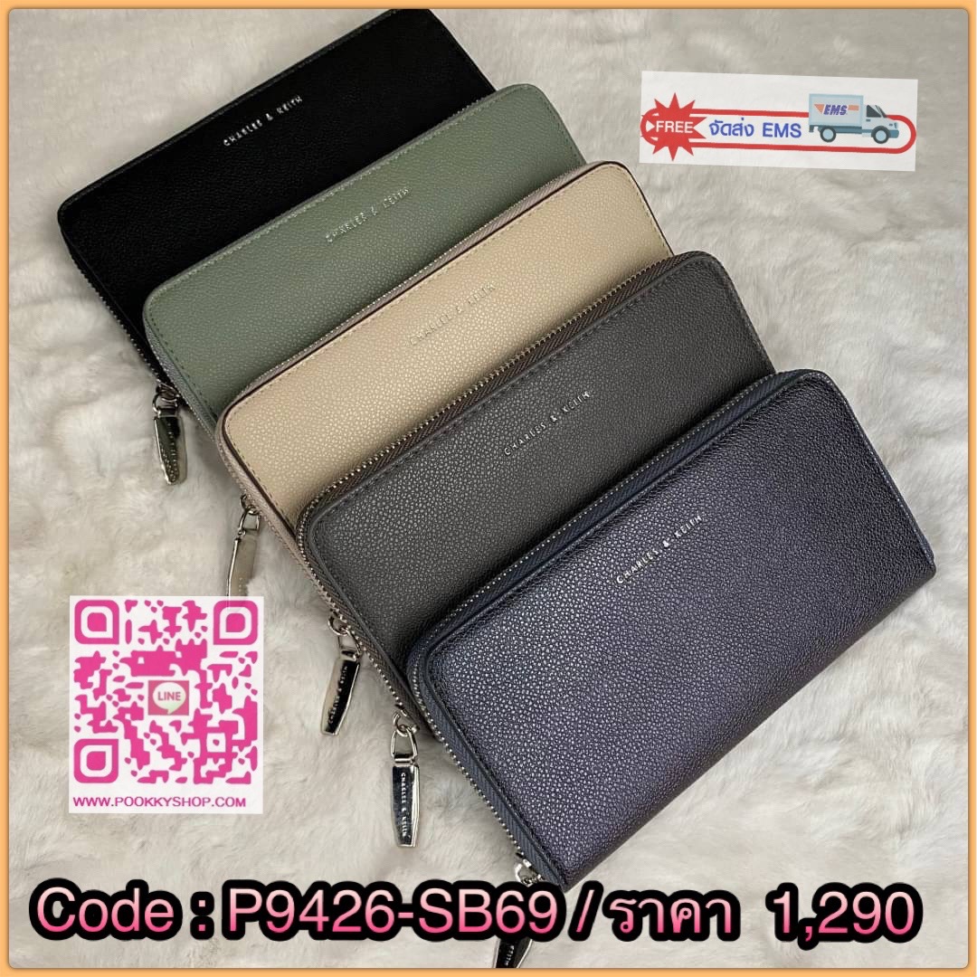 CHARLES & KEITH LONG ZIP AROUND WALLET กระเป๋าเงินใบยาวซิปรอบถูกหลังฮวงจุ้ย คอลเลคชั่นสีสุภาพหนังปั๊มลายคาเวียร์ทั้งใบ น้ำหนักเบา ด้านในกระเป๋าแบ่งเป็น 3 ช่องใหญ่ มีช่องซิปใส่เหรียญตรงกลาง จุการ์ด 12 ช่อง สามารถใส่ธนบัตรได้ตามยาวอีก 2 ช่อง มาพร้อมกล่องและ