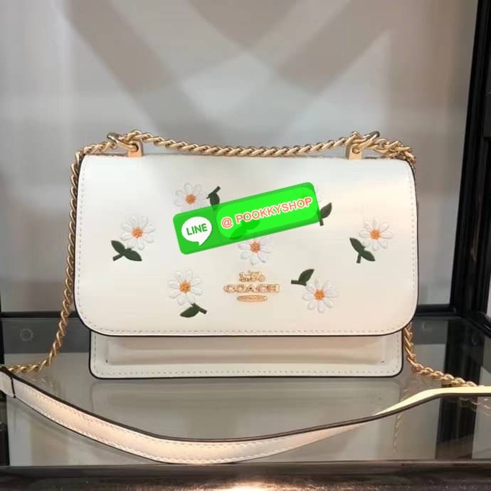 KLARE CROSSBODY WITH Flowers EMBROIDERY IM/CHALK MULTI Smooth leather| Inside zip and multifunction pockets| Snap closure, fabric lining| Outside slip pocket| Strap with 22" drop doubles up for three ways to wear: short or long on the shoulder or cro
