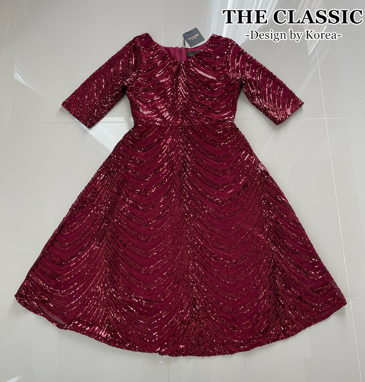 เดรสแฟชั่น ชุดเดรสออกงานปักเลื่อมใช้ผ้าเนื้อดีปักด้วยเลื่อมสีเงิน