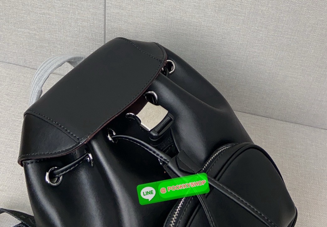 COACH PACE BACKPACK COACH CR100 | Refined calf leather | Inside zip and multifunction pockets | Drawstring and speedclip closures, fabric lining | Handle with 3" drop | Outside zip pocket | Outside zip access to interior |