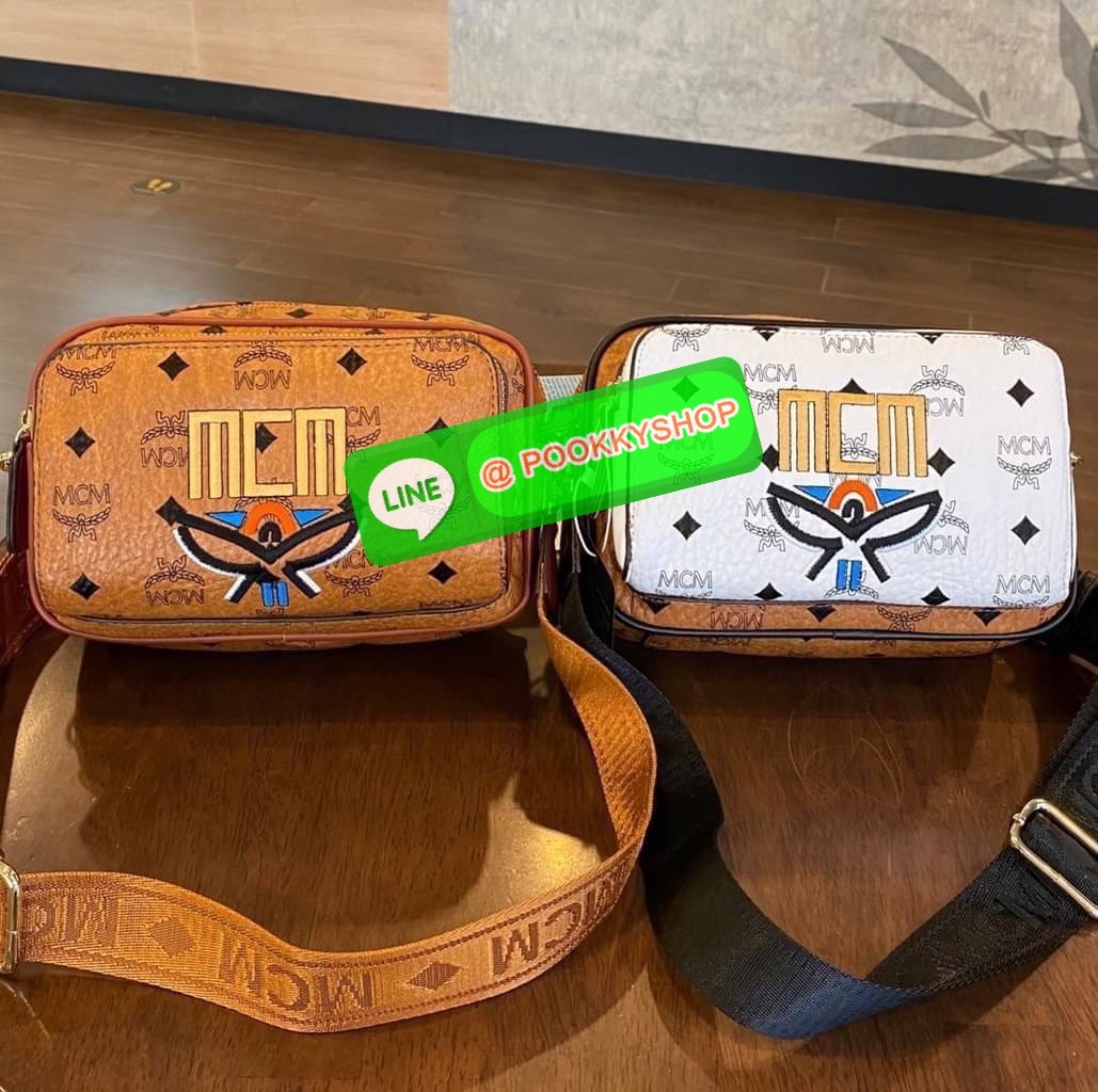 MCM Klassik Crossbody in Visetos Mix The small Klassik crossbody bag gains a color block monogram aesthetic this season.