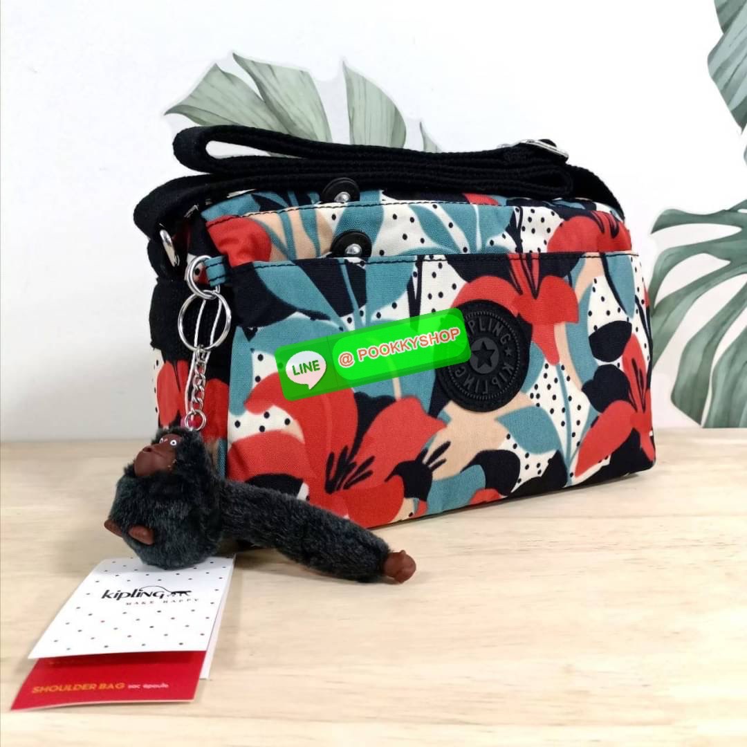 KIPLING Mini Crossbodybag กระเป๋าสะพายข้างขนาดกะทัดรัด ผลิตจากวัสดุ Nylon + ซับใน Polyester100% มีช่องใช้งานแยกย่อยมากถึง 4 ช่อง -ด้านหน้ามีช่องซิป 2 ช่อง -ช่องหลักโล่ง กว้าง จุของใช้ได้เยอะ -ด้านหลังมีช่องซิปอีก 1 ช่อง มาพร้อมพวงกุญเเจลิง สายสะพายยาวสมาร