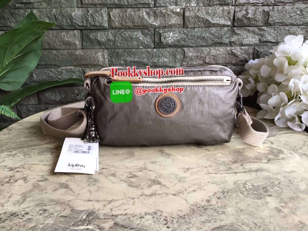 Kipling Yoku Medium Crossbody bag convertible to waistbag กระเป๋าคาดอกและสะพายข้าง คอลเลคชั่นใหม่ล่าสุดจาก Part of the Edgeland Plus วัสดุ100% polyester วัสดุกันน้ำ สีสันสไตล์วินเทจ ดูเป็นเอกลักษณ์ น้ำหนักเบา สะพายแล้วคล่องตัว ภายในกว้าง ใส่กระเป๋าเงินใบย