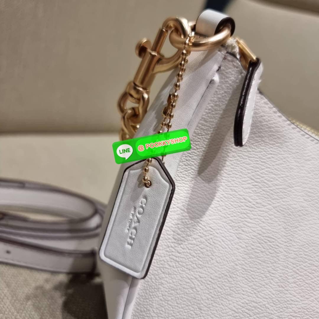 COACH CA548 TERI SHOULDER BAG IN SIGNATURE CANVAS คอลเลคชั่นใหม่ล่าสุด ที่สาวๆรอคอย กระเป๋าสะพายไหล่กึ่งทรงพอช พร้อมเสิร์ฟความสวยถึงบ้านไปเลยก่อนใคร แบบไม่ต้องพรีฯ ด้วยดีไซน์คลาสสิคที่แอบแฝงความเรียบหรู มาพร้อมสายสะพาย 2 เส้น เป็นสายโซ่คล้องแขนและสายสะพาย