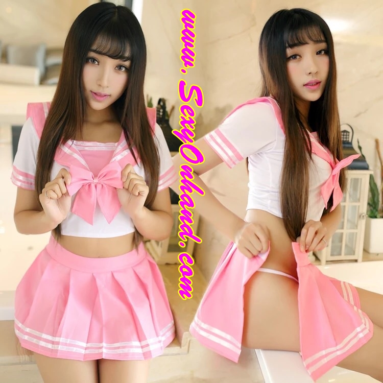 แฟนซี ชุดคอสเพลย์ ชุดนักเรียนญี่ปุ่น ปกทหารเรือสีชมพูแต่งขลิบ ขาวกระโปรงชมพูอัดจีบรอบ แต่งแถบริบบิ้นขาว พร้อมโบว์ผูก เข้าชุด ตัวเสื้อเป็นผ้ายืดเนื้อหน