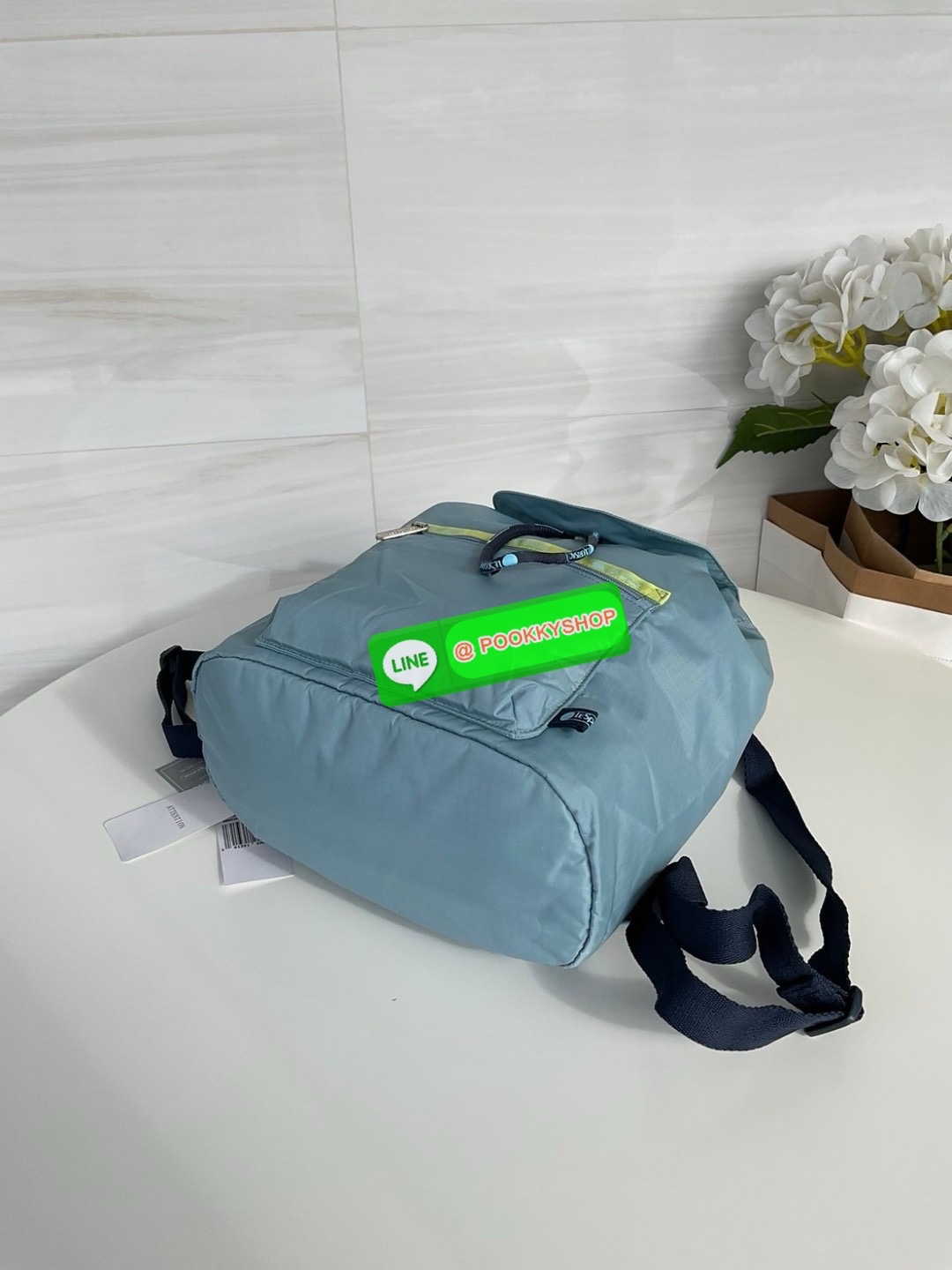 🚚 พร้อมส่ง 🚚 Japan LeSportsac Casual Versatile Portable Women's Bag Solid Color Blue Bucket Bag Flip Backpack สินค้าแบรนด์แท้100% พร้อมแท็ก! กระเป๋าเป้สะพายหลังลําลอง ทรงบักเก็ต น้ําหนักเบา กระเป๋าเป้หูรูด กระเป๋าเดินทางขนาดกลาง ด้านห