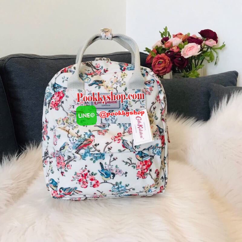Best Seller !! Cath Kidston Multi Strap Backpack กระเป๋าสะพายเป้รุ่นมินิ แบรนด์ดังสไตล์วินเทจสุดฮิต วัสดุ Canvas เคลือบกันน้ำสามารถเช็ดทำความสะอาดง่าย เปิดปิดกระเป๋าด้วยซิปสะดวกใช้ ด้านหน้าประดับโลโก้แบรนด์สวยโดดเด่น พร้อมช่องซิปด้านหน้ากระเป๋าอีกหนึ่งช่อ