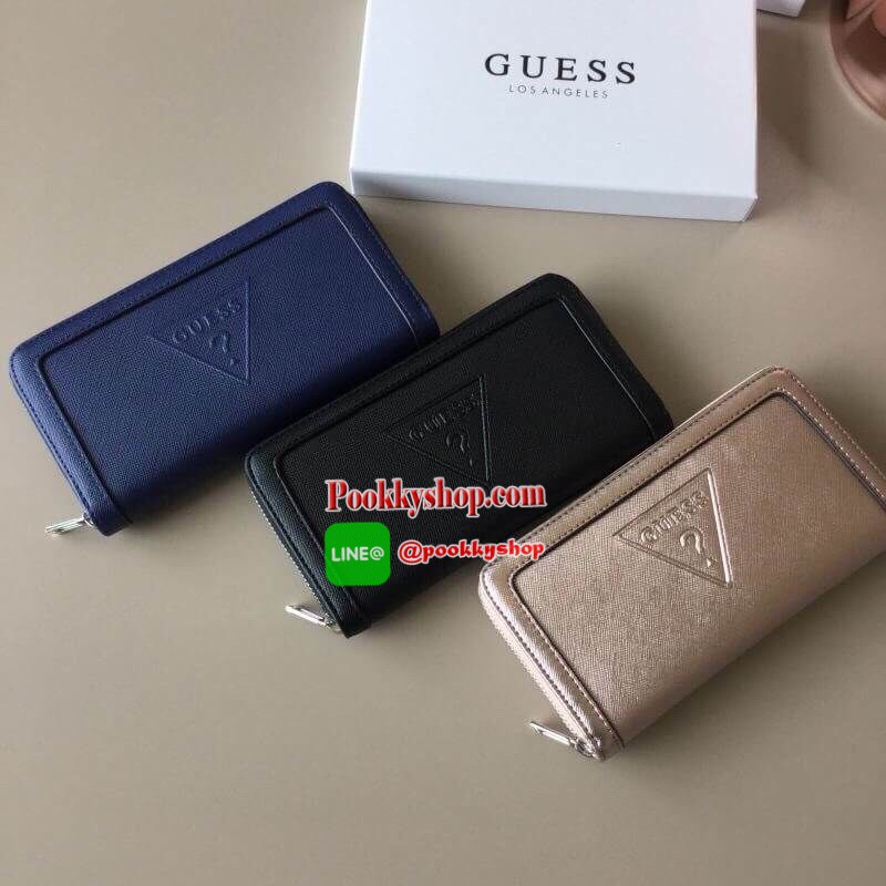 Guess Wallet Baldwinpark bag กระเป๋าสตางค์ใบยาวจาก GUESS วัสดุ Saffiano PVC คุณภาพดี น้ำหนักเบา ด้านหน้าประดับด้วยโลโก้แบรนด์สุดหรู เปิดปิดกระเป๋าด้วยซิปรอบสะดวกใช้ ภายในมีช่องซิปสำหรับใส่เหรียญ มีช่องใส่บัตรหลายช่อง หัวซิปปั้มแบรนด์ สามารถใส่มือถือ iphon