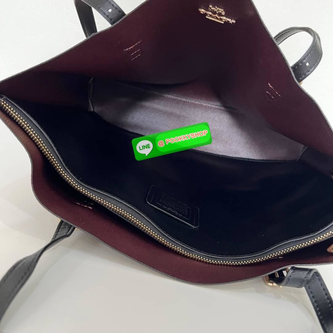 Coach MOLLIE TOTE IN SIGNATURE CANVAS (COACH 1665) กระเป๋าหนังใบเคลือบซิกเนเจอร์และหนังเรียบ ภายในกระเป๋ามัลติฟังก์ชั่น ปิดด้วยซิป ซับในผ้า หูหิ้วพร้อมหูหิ้ว 10 1/4" ช่องเปิดด้านข้าง