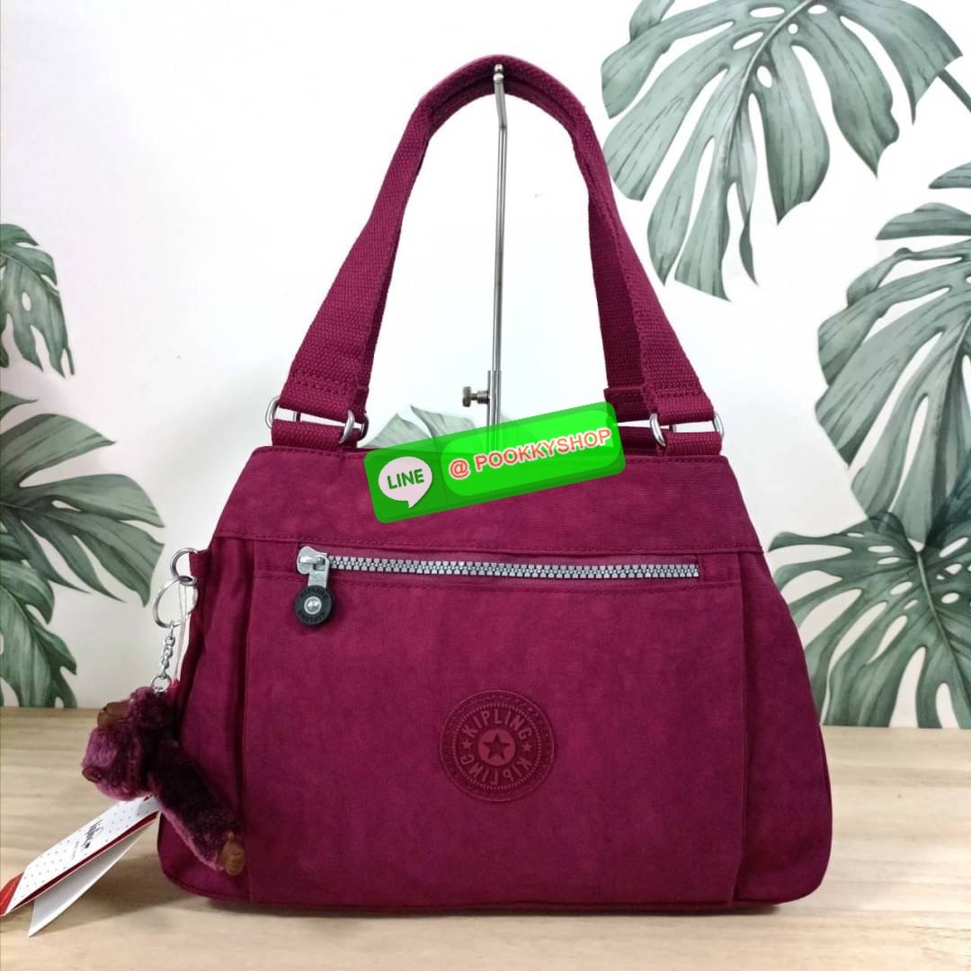 KIPLING ELISE HANDBAG กระเป๋าถือและสะพายไหล่ วัสดุ Nylon +Polyester ขนาดกำลังพอดี จุของได้มาก มีหูจับสองสาย ถือสะดวก น้ำหนักเบา มีช่องซิป ด้านหน้า ช่อง กระเป๋าหลักเปิด-ปิดด้วยซิป มี3 ช่องว่างใส่ของได้จุมากๆ ใส่มือถือได้ กระเป๋าสตางค์ใบยาว และ เครื่องสำอาง