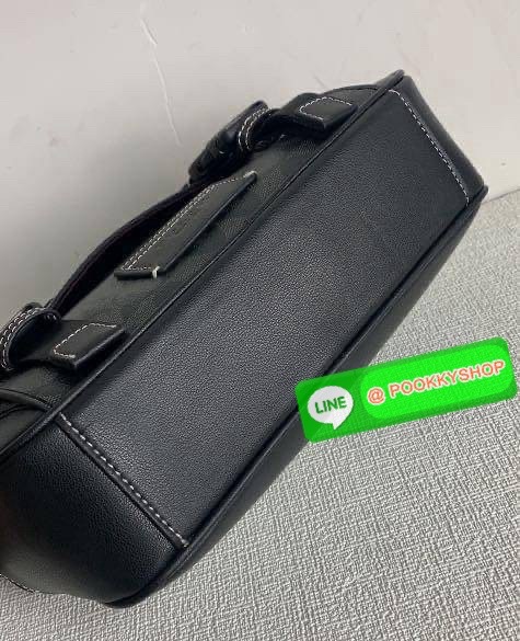 Coach Disney X Coach Track Crossbody In Signature Canvas With Patches Signature coated canvas and smooth calf leather Inside multifunction pockets Zip and speedclip closures, fabric lining Outside slip pocket