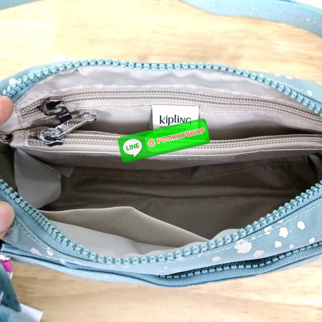 KIPLING Monkey program K16217 Seoul up sling bag รุ่น 3 ซิป สะพายข้าง ขนาดเล็กทรงสี่เหลี่ยมผืนผ้า วัสดุ Nylon 100% หลสกหลายฟังก์ชั่นใช้งาน ครบครันในใบเดียว