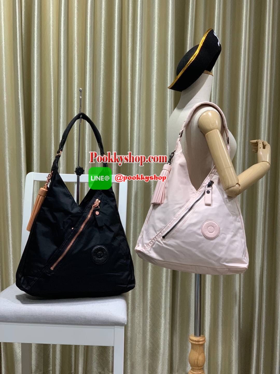 Kipling OLINA Medium Tote Bag Rose Bag คอลเลคชั่นใหม่จาก Paka Premium กระเป๋าถือหรือคล้องบ่าขนาดกลาง วัสดุ Polyester100% อะไหล่สีRose goldทั้งหมดรวมถึงเจ้าพวงกุญแจmonkeyและพู่หนังrubber เพิ่มความหรูหรา คอลเลคชั่นนี้เน้นความกว้างใส่ของได้อย่างจุใจ และยังมี
