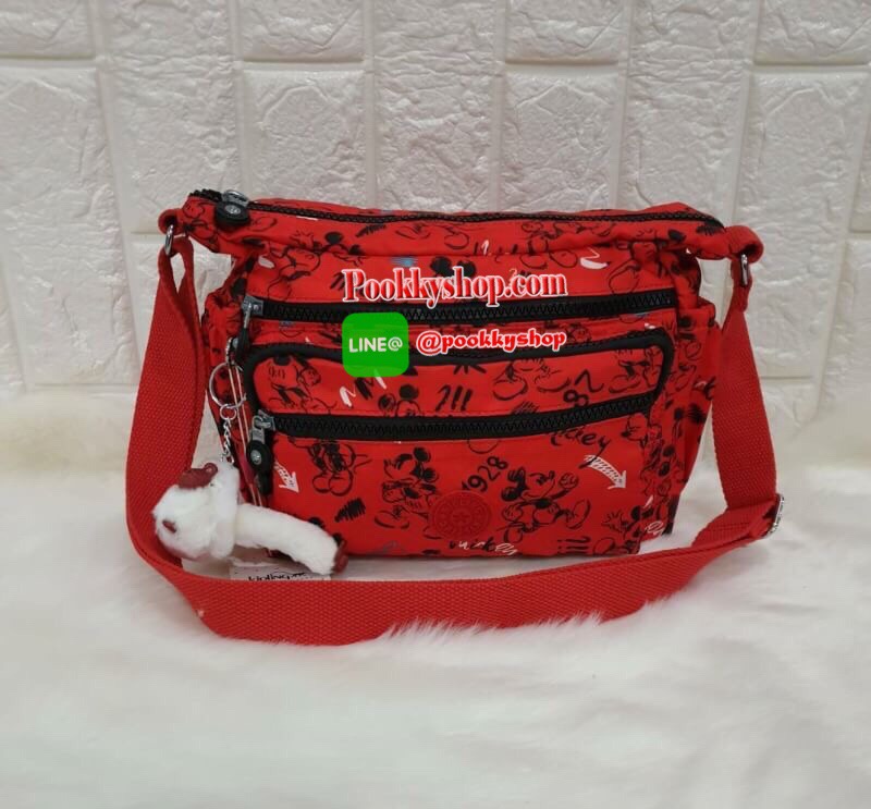พร้อมส่ง KIPLING CROSSBODY BAG กระเป๋าสะพายพิมพ์ลายมิกกี้สีสันสดใส จุดเด่นมีช่องซิปหลายช่อง จุของได้เยอะและเป็นสัดส่วน มาพร้อมกับสายสะพายที่สามารถปรับระดับได้ จะสะพายข้างหรือสะพายแบบเฉียงก็ดูดีนะคะ รุ่นนี้ขอแนะนำเลยค่าาา