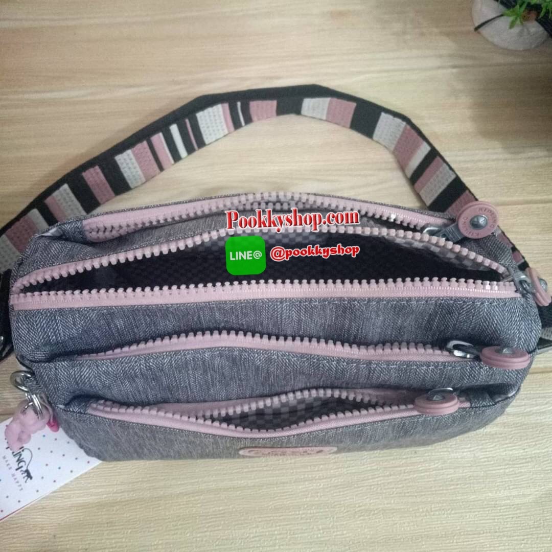 KIPLING Mini Crossbodybag กระเป๋าสะพายข้างขนาดกะทัดรัด ผลิตจากวัสดุ Nylon+ Polyester100% มีช่องใช้งานแยกย่อยมากถึง 4 ช่อง -ด้านหน้ามีช่องซิป 2 ช่อง -ช่องหลักโล่ง กว้าง จุของใช้ได้เยอะ -ด้านหลังมีช่องซิปอีก 1 ช่อง มาพร้อมพวงกุญเเจลิง สายสะพายยาวสามารถปรับไ