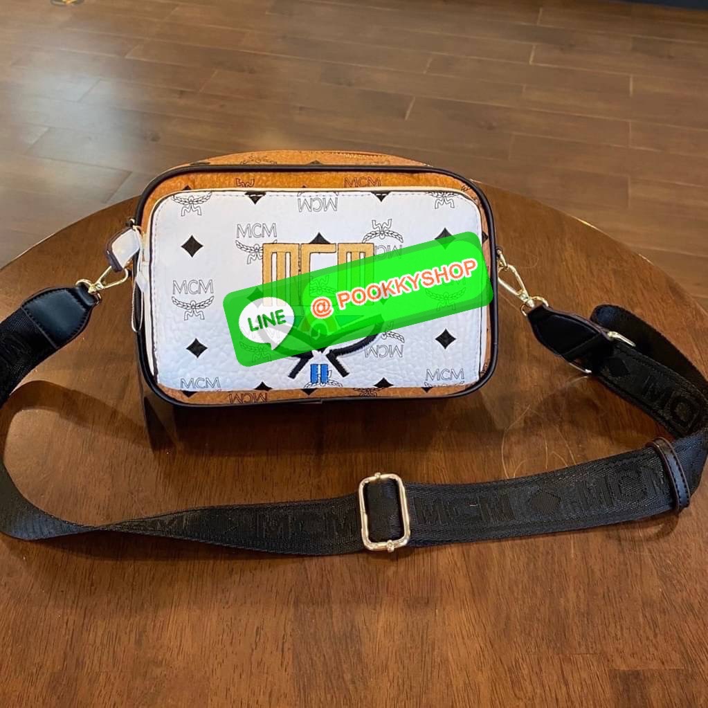 MCM Klassik Crossbody in Visetos Mix The small Klassik crossbody bag gains a color block monogram aesthetic this season.