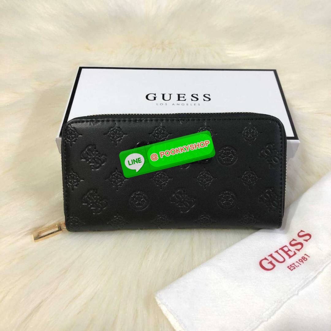GUESS WOMEN'S LONG WALLET กระเป๋าสตางค์ใบยาว สวยมากค่ะ เปิดปิดด้วยซิป ด้านหน้าประดับโลโก้แบรนด์ ด้านหลังมีช่องซิป หัวซิปแบรนด์ทุกจุด ภายในมีช่องใส่ธนบัตรแบงก์พัน ช่องซิปกลางและช่องใส่บัตรหลายช่องสวยน่าใช้ทุกสีค่ะ มาพร้อมกล่องกระดาษแบรนด์และถุงผ้ามอบเ
