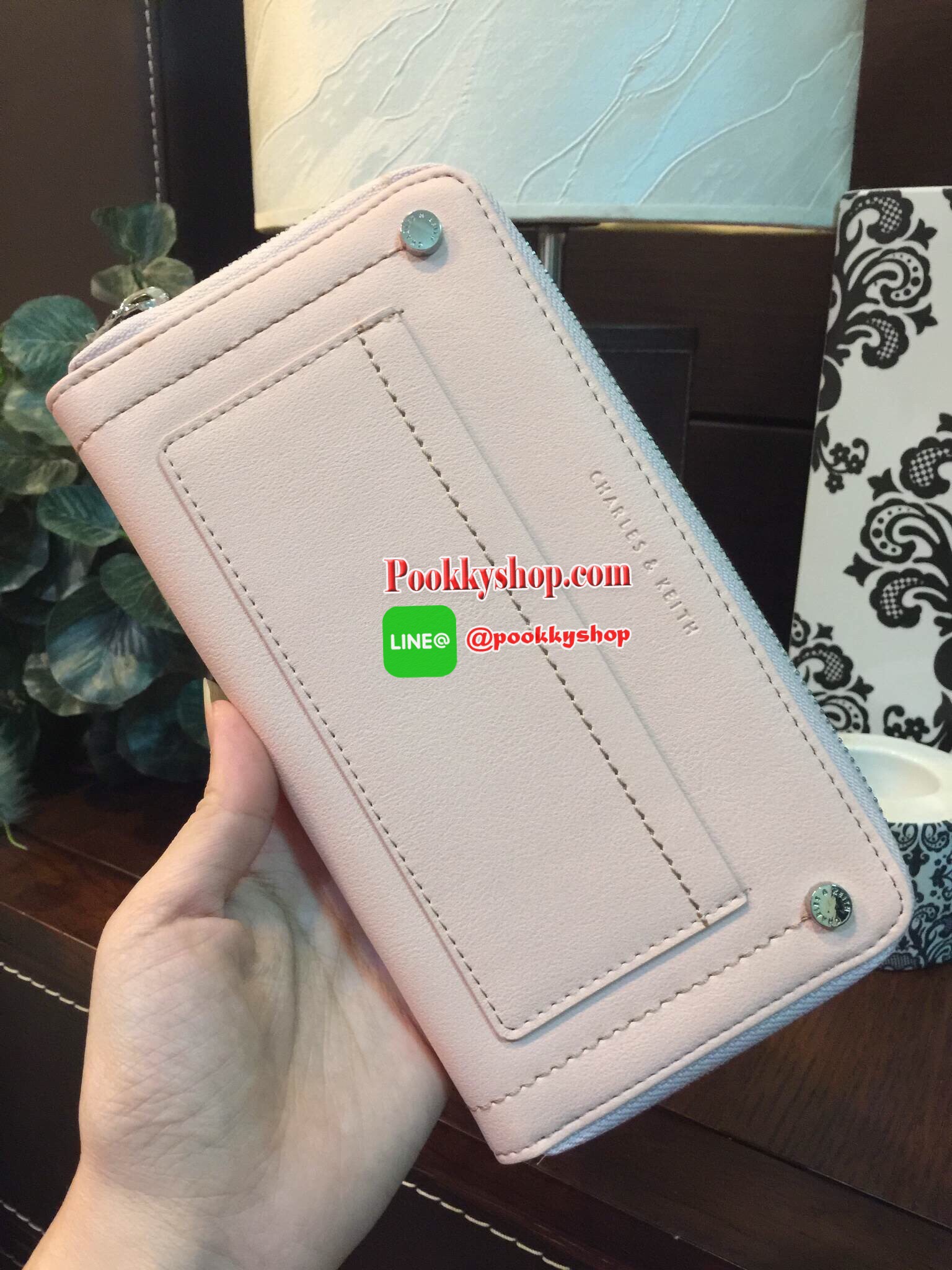 NEW! CHARLES & KEITH STUDDED FRONT POCKET WALLET กระเป๋าสตางค์ใบยาวซิปรอบรุ่นใหม่ล่าสุดแบบชนช็อปวัสดุหนังเรียบอยู่ทรงสวย เปิดปิดด้วยซิปรอบด้านหน้าแต่งหมุด พร้อมปั้มโลโก้ด้านหน้าดูสวยหรูมีสไตล์ ภายในมีช่องซิปและช่องใส่บัตรหลายช่องใส่ iphone7+ ธนบัตร บัตรได