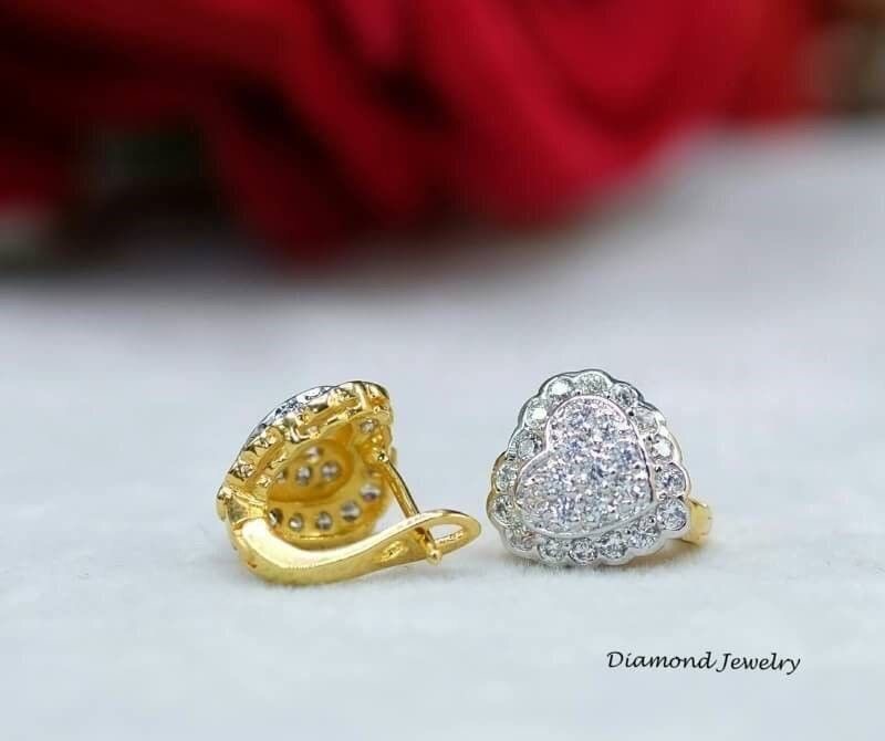 Best seller item !!!!!! ต่างหูเพชรสวิส หัวใจเพชร งานอย่างดีค่ะ รับประกันคุณภาพเลยค่ะ รุ่นนี้ดีไซส์สวยที่สุด ใส่ออกมาดูดีมว๊ากกกก งานเพชรฝังอย่างดีไม่ใช่งานติดกาวนะคร๊าาา เพชรวิ้งเฟร่อ ใส่ออกงานชิคๆหรือใส่ไปเที่ยวชิลๆ ไม่ผิดหวังแน่นอนคะ ตัวเรือนสีทองชุบ 5