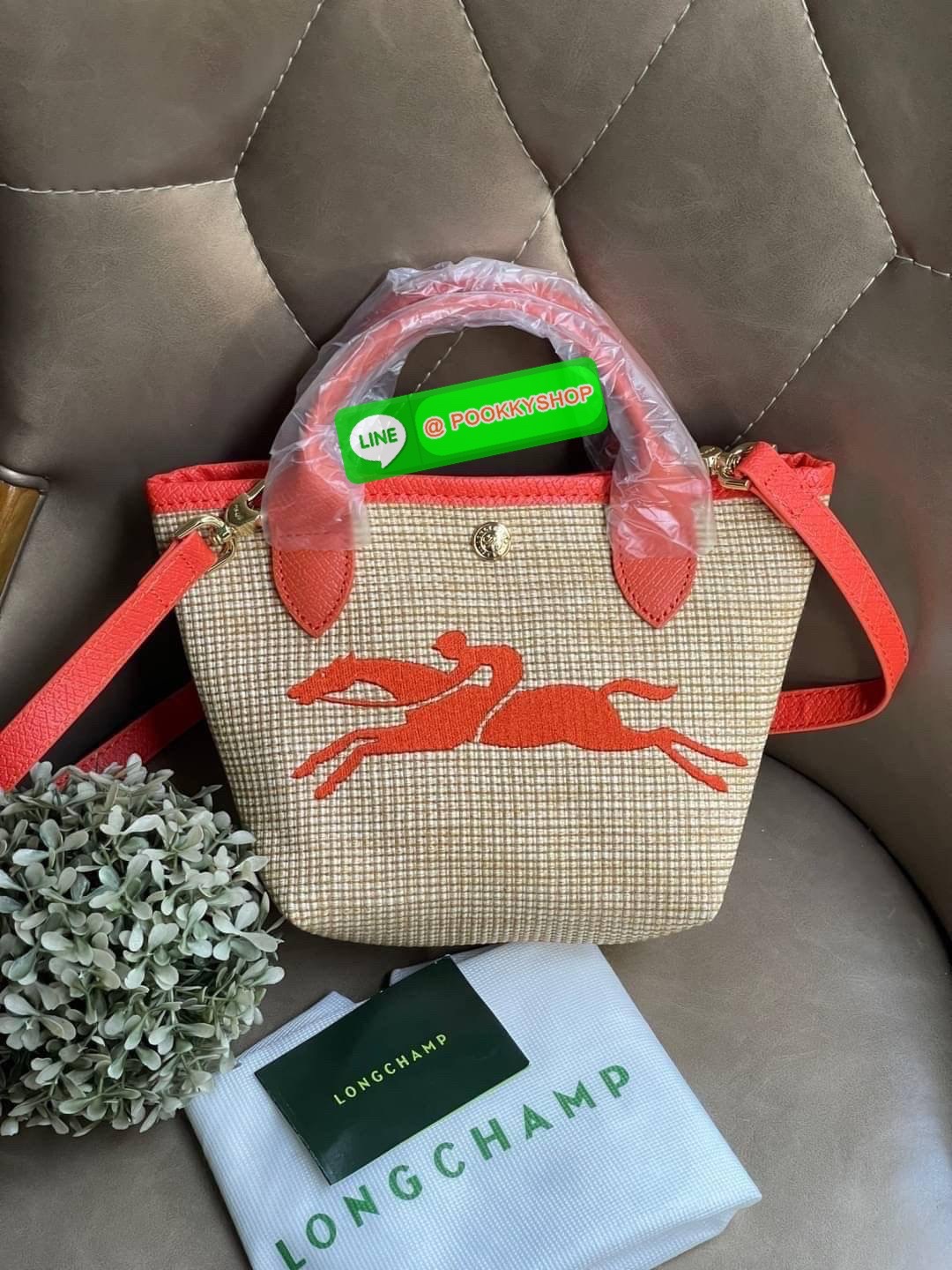 ðLONGCHAMP Le Pliage Paris - St Tropez Handtasche āļĢāļļāđāļāđāļŦāļĄāđāļāļēāļāđāļāļĢāļāļāđ āđāļāđāļāļāļĢāļ°āđāļāđāļēāļāļ·āļāļŦāļĢāļ·āļāļŠāļ°āļāļēāļĒ āļāļēāļāļŠāļēāļ raffia āļāļēāļāļāļĢāļ°āđāļāđāļēāļāļąāļāļāđāļ§āļĒāļŦāļāļąāļāļŠāļĩāļāđāļ§āļĒāļĨāļļāļāļāđāļŠāļļāļāđāļāđāļāļāļāđāļŦāļĨāđāļē Celebrities āļāļąāļāļāļĢāļ°āđāļāđāļēāļāļīāļāļāļīāļāļŠāļļāļāļŪāļīāļāļāļēāļ Longchamp āļāļĒāđāļēāļ Le Pliage Paille (āđāļĨāļ āļāļĨāļīāļĒāļēāļ āđāļāļĨāđ) āļĄāļĩāđāļĨāđ