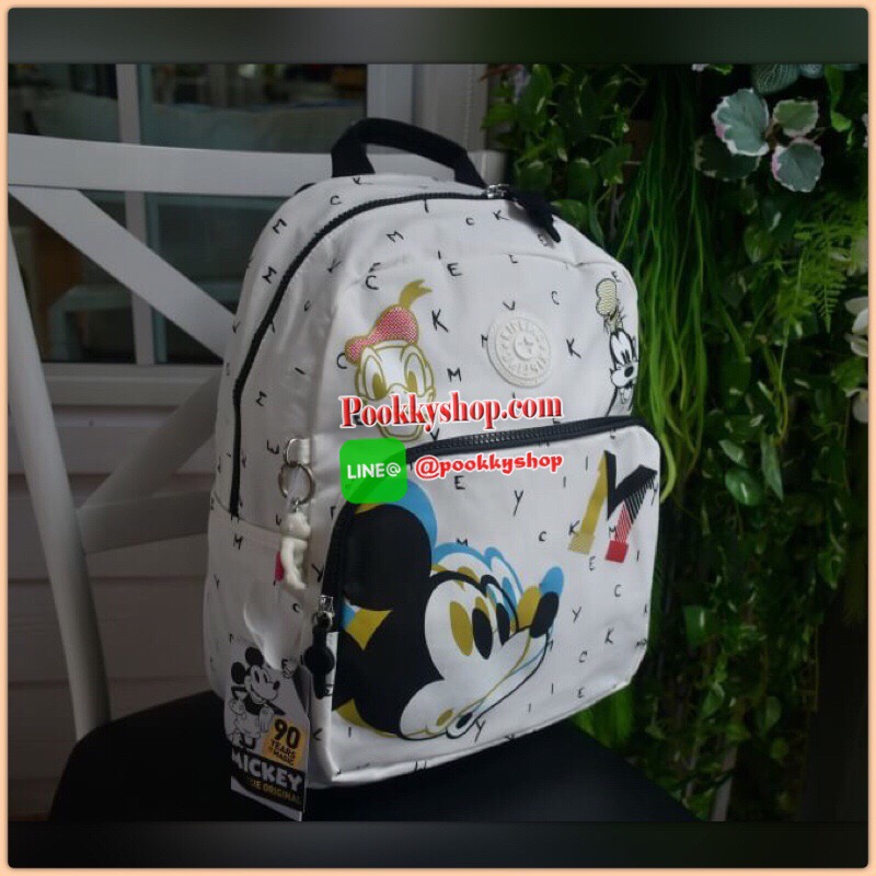 Kipling & Disney Summer 2019 Minnie Mouse and Mickey Mouse กระเป๋าเป้สะพายหลังสไตล์ Backpack มาพร้อมพวงกุญแจลิง ด้านหน้ามีช่องซิปแยกใส่ของจุกจิก ด้านข้างมีกระเป๋าข้าง ภายในช่องใหญ่หลัก มีช่องซิปใส่ของ พร้อมช่องเล็ก2ช่อง เปิด-ปิด ด้วยซิป วัสดุผ้ากันน้ำ จุข