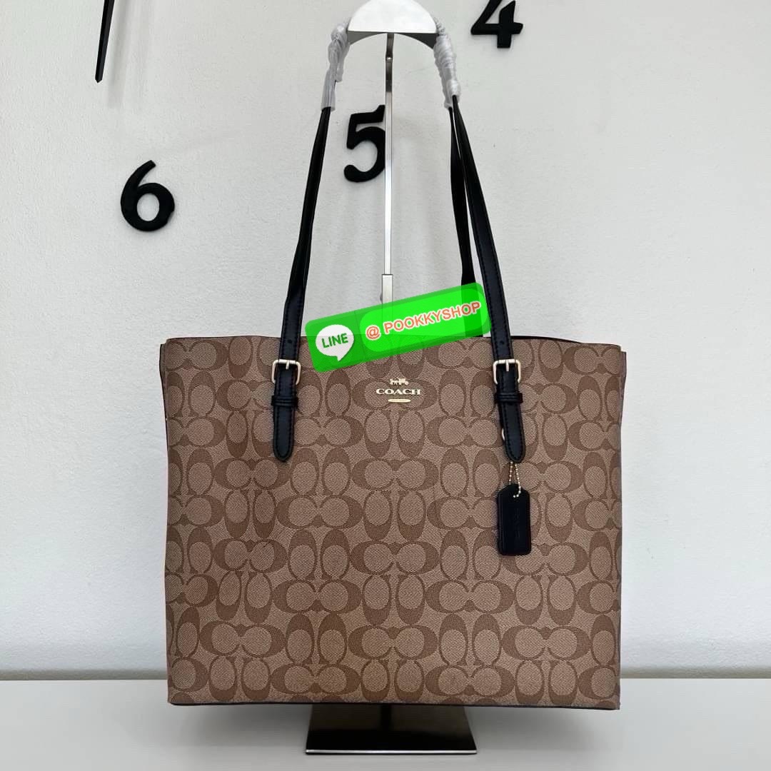 Coach MOLLIE TOTE IN SIGNATURE CANVAS (COACH 1665) กระเป๋าหนังใบเคลือบซิกเนเจอร์และหนังเรียบ ภายในกระเป๋ามัลติฟังก์ชั่น ปิดด้วยซิป ซับในผ้า หูหิ้วพร้อมหูหิ้ว 10 1/4" ช่องเปิดด้านข้าง
