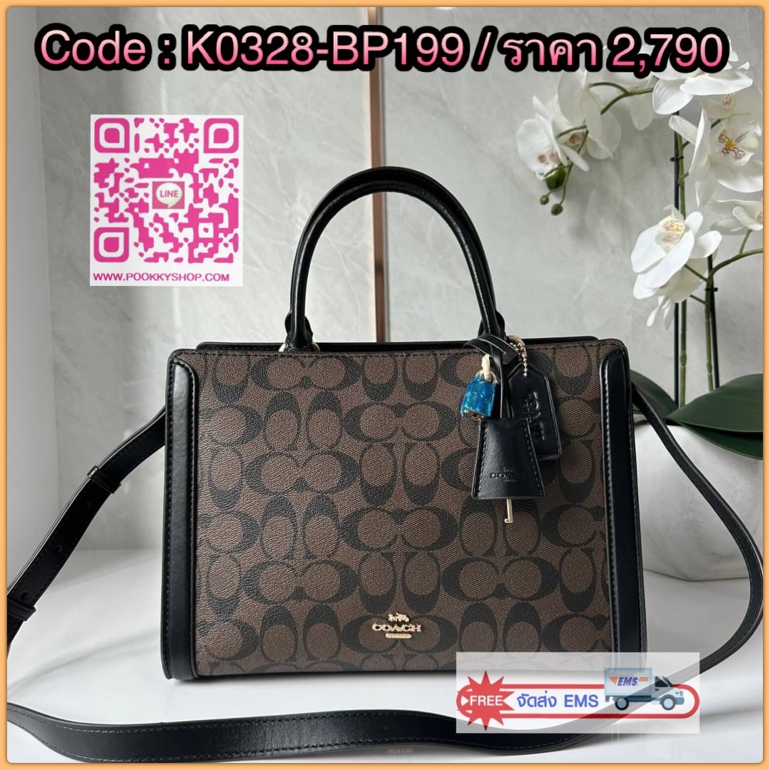 COACH ZOE CARRYALL IN SIGNATURE CANVAS (F87665) กระเป๋าถือหรือสะพาย ผู้ดีคุณนาย วัสดุหนังแคนวาส ตัดขอบหนังแท้ เปิด-ปิดด้วยซิปคู่ ตกแต่งด้วยตัวล็อคแม่กุญแจห้อยด้านหน้า ด้านในเป็นช่องกว้างใส่ของได้เยอะ มีสายสะพายยาว ถอด-ปรับระดับได้ สวย หรู ดูแพงมาก