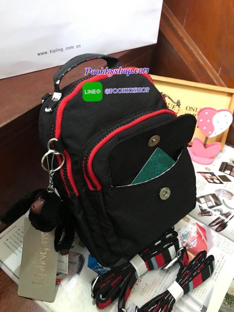 kipling alber solid Convertible mini backpack (HD7349) กระเป๋าเป้ขนาดมินิ สไตล์3in1 ที่สามารถถือ/สะพายข้างหรือเป็นเป้ก็ได้ มีช่องซิปใช้งาน2ช่อง ภายในแบ่งเป็นช่องเล็กใส่ของจุกจิก ด้านหน้าเพิ่มช่องเล็กเปิดปิดด้วยกระดุมแม่เหล็ก มาพร้อมพวงกุญแจลิงขนปุกปุยและส