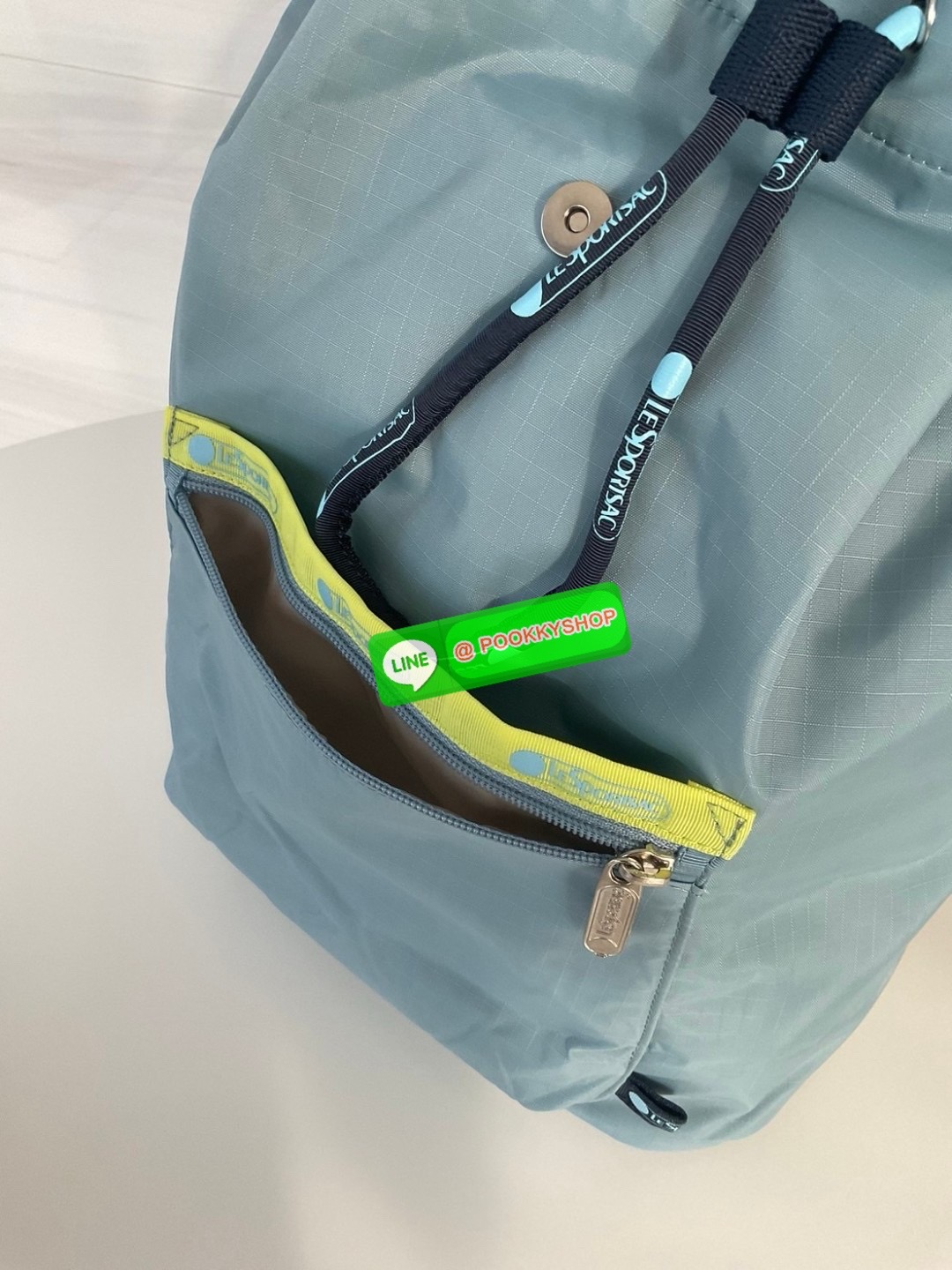 🚚 พร้อมส่ง 🚚 Japan LeSportsac Casual Versatile Portable Women's Bag Solid Color Blue Bucket Bag Flip Backpack สินค้าแบรนด์แท้100% พร้อมแท็ก! กระเป๋าเป้สะพายหลังลําลอง ทรงบักเก็ต น้ําหนักเบา กระเป๋าเป้หูรูด กระเป๋าเดินทางขนาดกลาง ด้านห