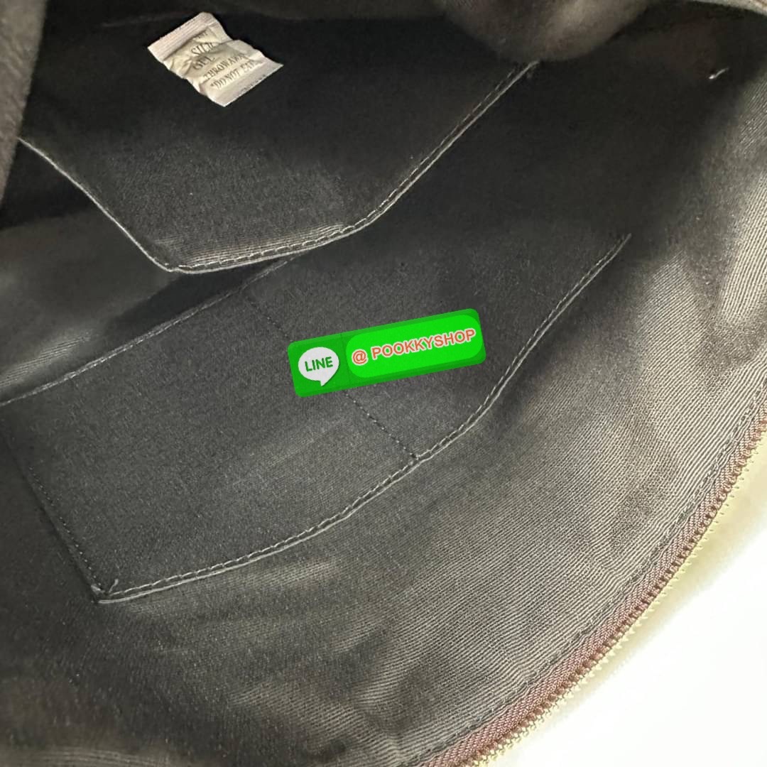 Coach 4455 ZIP TOP TOTE IN SIGNATURE CANVAS กระเป๋าสะพายไหล่ทรง Tote เปิด-ปิดกระเป๋าด้วยซิป ป้องกันของตกหล่น ภายในกว้างใส่สัมภาระได้เยอะ มีช่องเล็กใส่ของจุกจิก วัสดุแคนวาส หูจับหนังแท้ ถือไปเที่ยว ไปทำงาน สะดวกเลยค้า