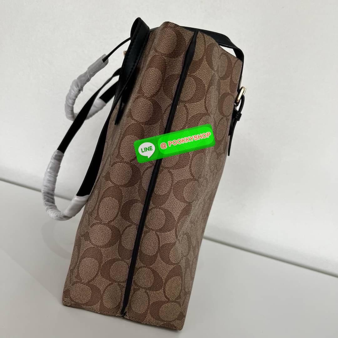Coach MOLLIE TOTE IN SIGNATURE CANVAS (COACH 1665) กระเป๋าหนังใบเคลือบซิกเนเจอร์และหนังเรียบ ภายในกระเป๋ามัลติฟังก์ชั่น ปิดด้วยซิป ซับในผ้า หูหิ้วพร้อมหูหิ้ว 10 1/4" ช่องเปิดด้านข้าง