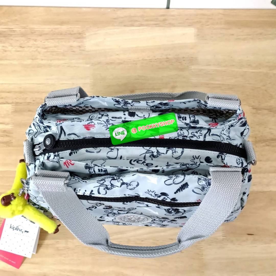 KIPLING ELISE HANDBAG กระเป๋าถือและสะพายไหล่ วัสดุ Nylon +Polyester ขนาดกำลังพอดี จุของได้มาก มีหูจับสองสาย ถือสะดวก น้ำหนักเบา มีช่องซิป ด้านหน้า ช่อง กระเป๋าหลักเปิด-ปิดด้วยซิป มี3 ช่องว่างใส่ของได้จุมากๆ ใส่มือถือได้ กระเป๋าสตางค์ใบยาว และ เครื่องสำอาง