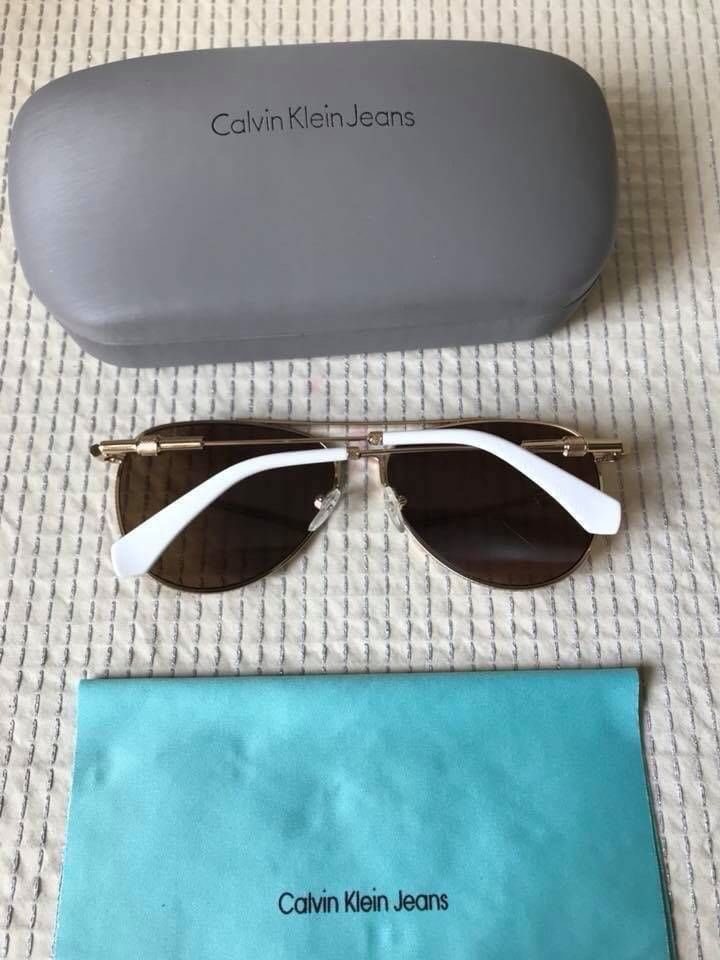 Calvin Klein Jeans CKJ162S สวยมากๆรุ่นนี้พลาดไม่ได้ อุปกรณ์ครบ พร้อมกล่องผ้าเช็ดแว่น กันแดดกันยูวี 100%