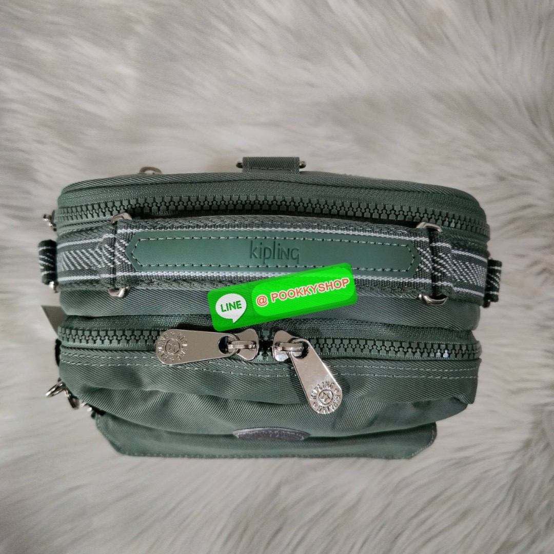 KIPLING Cand 2 ways backpack กระเป๋าถือหรือสะพายข้าง ขนาดกลาง วัสดุ Polyester 100% -ด้านหน้ามี 2 ช่องซิป -ช่องหลักโล่งกว้าง ใส่ของได้เยอะสุดๆ พร้อมช่องซิปและช่องแยกด้านข้างให้แยกของได้เป็นระเบียบมากขึ้น สามารถติใส่กระเป๋าสตางค์ใบยาวได้ มาพร้อมสายคล้องพวงก